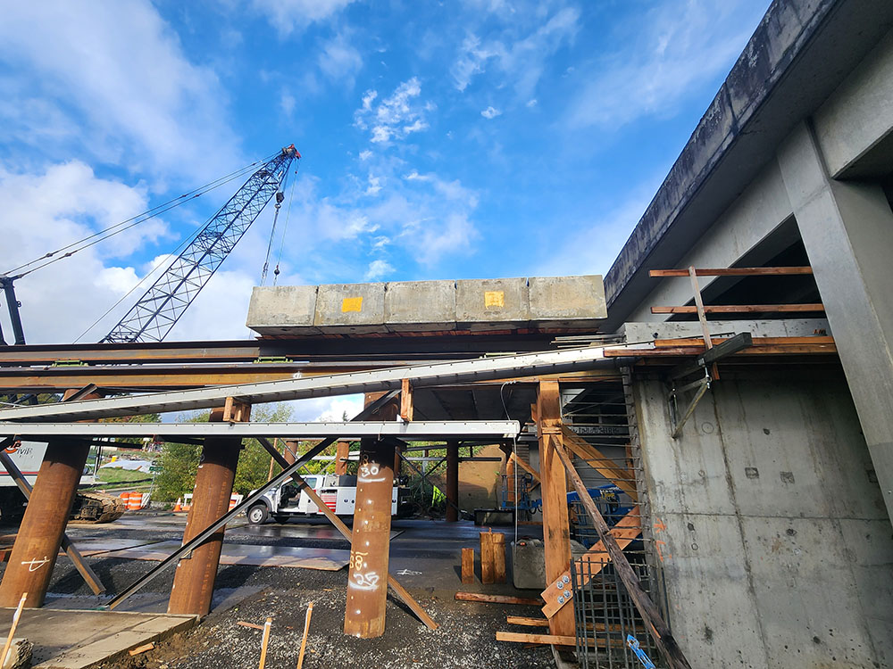 Construction progress pictures of the new structure under I-5 getting built on SW 26th Avenue