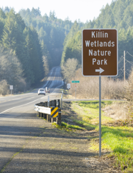 Photo showing Killian Wetlands Nature Park sign on OR 6