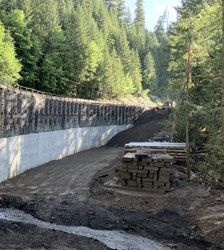 photo of a retaining wall being built on U.S. 20